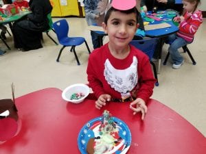 We decorated un upside sugar cone to look like a Christmas Tree! Yummy!