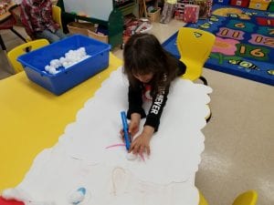 We used tweezers to pick up cotton balls to match the quantity we rolled on our big dice!