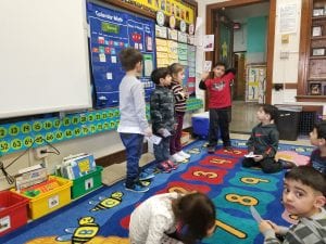 We are playing a math game called "I have... who else has?" We are matching numbers with their quantities.