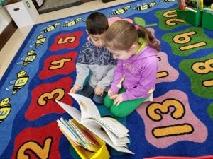 We began a new Daily 5 choice called Read to Someone! 