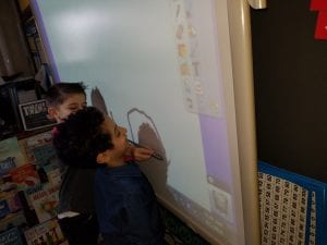 We used the Promethean Pen to trace our friends' shadows!