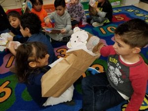 We used our groundhog puppets to tell our predictions!