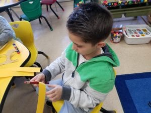 We used pencils to make curly lion manes!