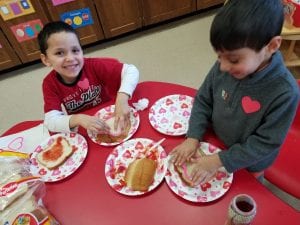 We made our own strawberry jam sandwiches and used heart shaped cookie cutters to make the heart shape.