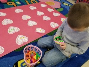 We practiced upper and lowercase letter matching using stickers!