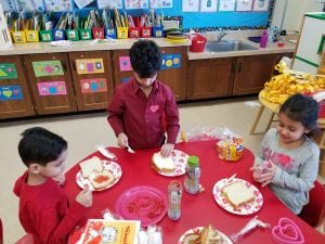 We made our own strawberry jam sandwiches and used heart shaped cookie cutters to make the heart shape.