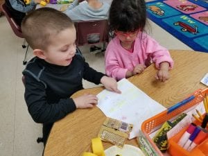 We buddied up with a kindergarten friend as they shared their writing with us!