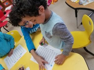 We are racing to 100 by rolling a dice and coloring the quantity of numbers.