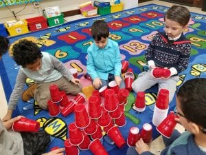 We are stacking 100 cups!