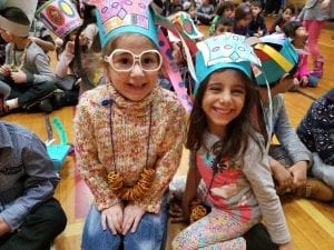 We ended our day with a March is Reading month celebration in the gym.