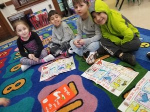 We are learning to identify the author and the illustrator of a book. We learned the author writes the words and the illustrator draws the pictures.