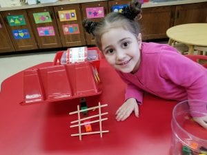We hid a plastic gold coin to trick the leprechaun inside our traps!