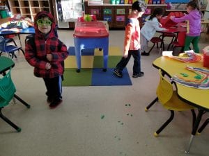 We walked in and saw all of the little green footprints everywhere!