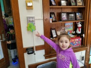 The leprechaun left shamrock clues that rhymed around the school for us to find the missing pointer!