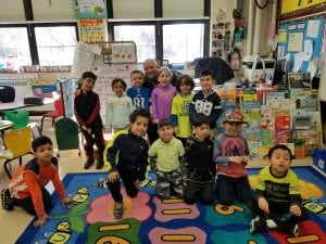 Firefighter Mike read us a book about firefighters as well as "Curious George VIsits the FIre Station"!