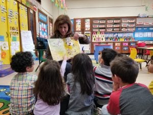 Mrs. Lamberti, the Director at Cotter, read to us!