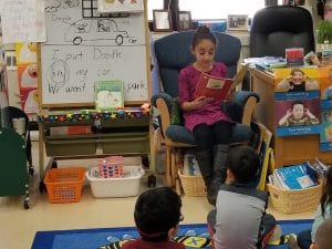We had a special friend from 4th grade read to us! 