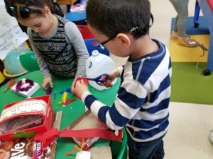 We worked with your book buddies to create awesome items from recycled materials!