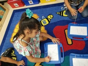 We began using our magic boards as we practiced forming the letter M!