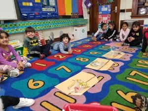 We sorted bundled/bagged items into groups of 2, 3, or 4! We told why we chose the Numbered Treasure Chest's number for our items!