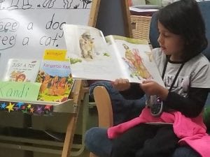 Lastly.....TAKE A LOOK!!! This is my Young 5 student from last year!!!! She asked to read a story to our class!!! Look at the confidence she has!!! Way to go Lana!!!