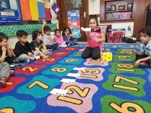 We practiced fluency of quantity recognition by rolling the dice and matching the quantity shown with its number card.
