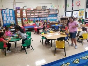Our 4th grade friend came to help during math workshop time.