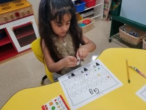 We practiced the sound for the letter Gg as we placed and sticker on the Ggs and said, "/g/ /g/ G, put a sticker on me!"