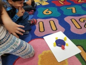 We practiced counting objects that are scattered. We practiced where to begin and where to stop as we counted each object and touched each object as we said the consecutive numbers. 