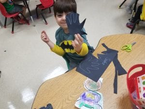 We made the characters for our narrative writing. We are working on a class book titled, "I Dreamed I was a Little Bat...". Each child will illustrate and share their idea of where they flew as a little bat during their dream. We traced our hands to cut them out for the wings.