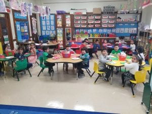 We created models of the apple we like using torn paper and a paper plate!