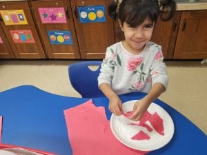 We created models of the apple we like using torn paper and a paper plate!