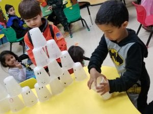 We began our day with Halloween centers! Here we are cup stacking ghosts with letters on the back!