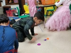We used the force of pushing with our breath to race spiders to letters we identified!