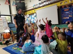 Officer Aaron Morandini talked to us about Halloween safety. He also read a story! We helped by using pictures to tell the story as he read it!n Thank you, Officer Aaron!