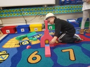 We have been creating some really cool ramps and ways to move the balls through our big blocks!