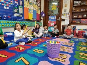 We used Ms. Stover's (Mrs. Faryniarz) rhythm sticks to tap the syllables in our friends' names!