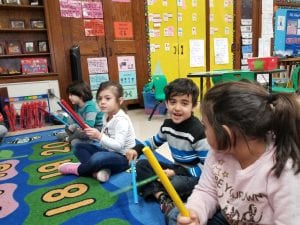 We used Ms. Stover's (Mrs. Faryniarz) rhythm sticks to tap the syllables in our friends' names!