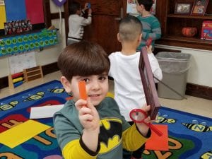 We are learning about 2D shapes! We were shape detectives as we used magnifying lenses and our cup of shapes to find objects in the room that matched our shapes. 