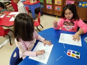 We used paints to dot the way down and up the letter letter W!