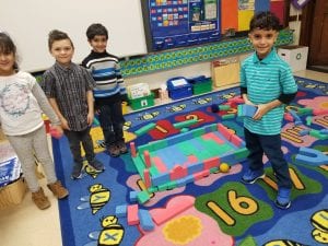 Check out this teamwork in action! They built a house with doors!