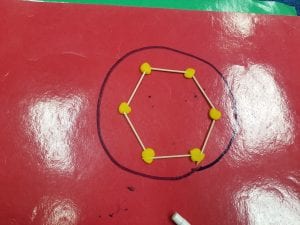 We used toothpicks and playdough to create hexagons as we learned about the differences between hexagons and circles!