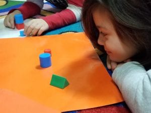 We laid on our bellies as we looked at the 3D shapes and saw they were not flat, but instead popped up!