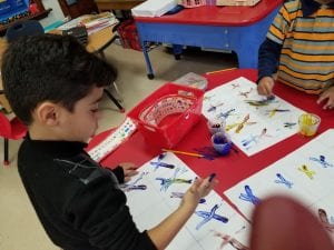 We finger painted the letter X as we practiced saying its sound.