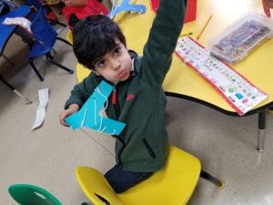 We sewed with yarn on the letter Y!