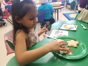 We decorated cookies with Mrs. Claus!