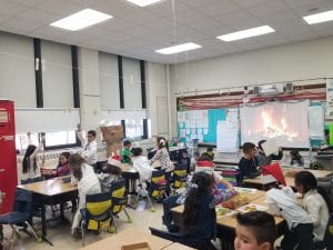 We had a book buddy Christmas gathering too! Ms. Earle had awesome center rotations in her classroom! Then we had ice cream and watched Frosty the Snowman in our classroom!