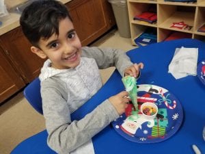 We had a Christmas party! We decorated edible Christmas trees!