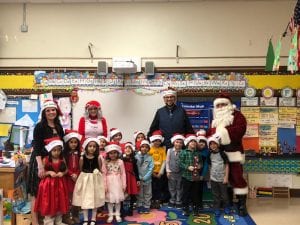 Mr. Abu-Rus came in to say hello to Santa and Mrs. Claus...and he wore his special hat!