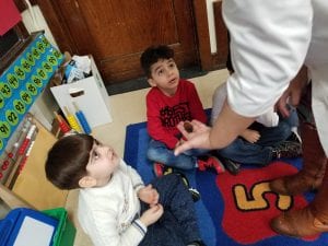 We had a scientist visit our classroom. She taught us about the differences between arachnids and insects. Here she is showing us a live Madagascar Cockroach!